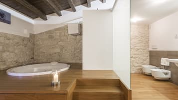 Suite | Bathroom | Rainfall showerhead, hair dryer, bathrobes, slippers