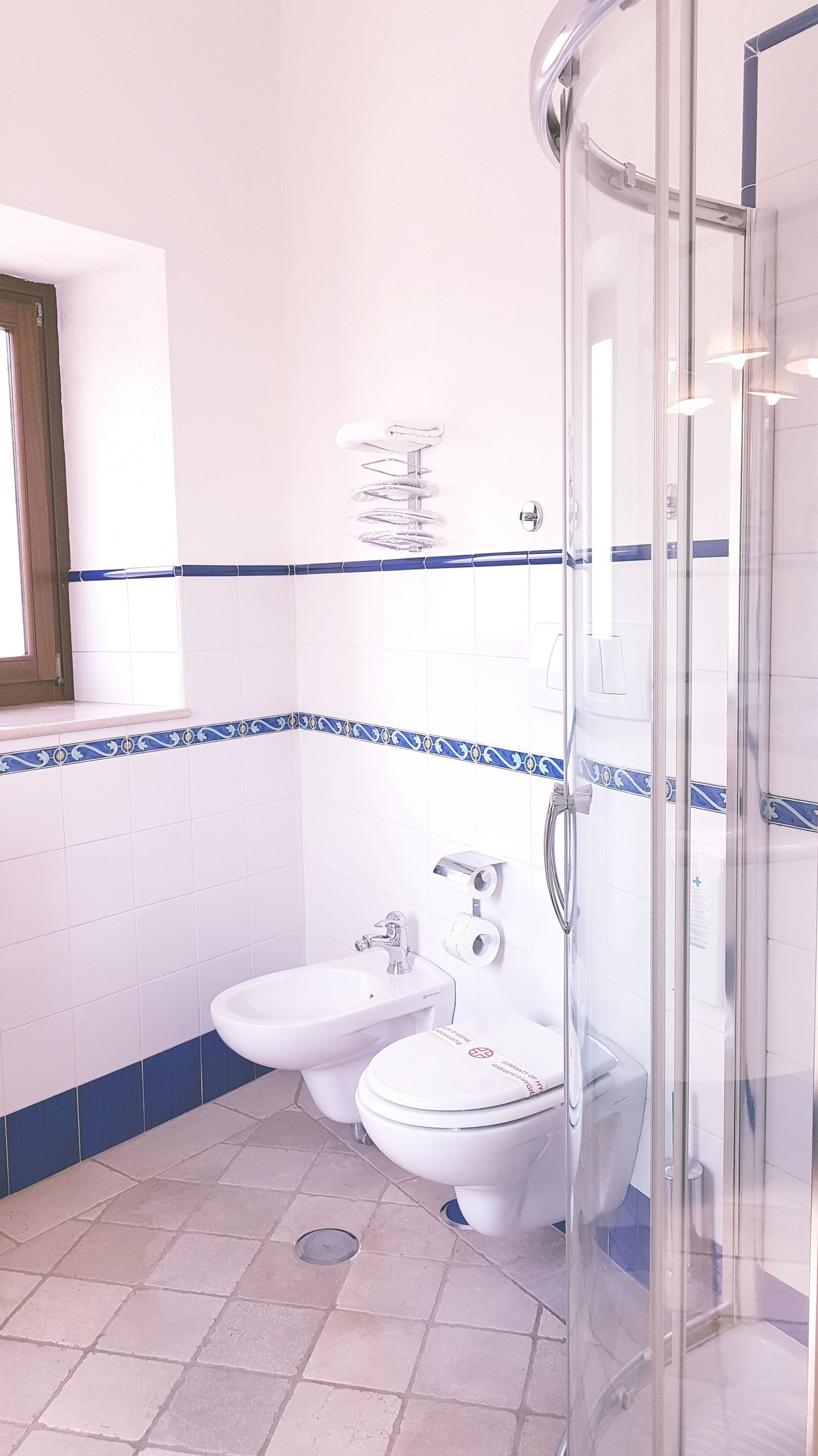 quadruple room | bathroom | free toiletries, hair dryer, slippers, bidet