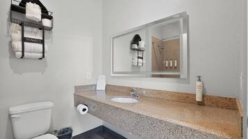 Room, 1 King Bed | Bathroom | Combined shower/tub, free toiletries, hair dryer, towels