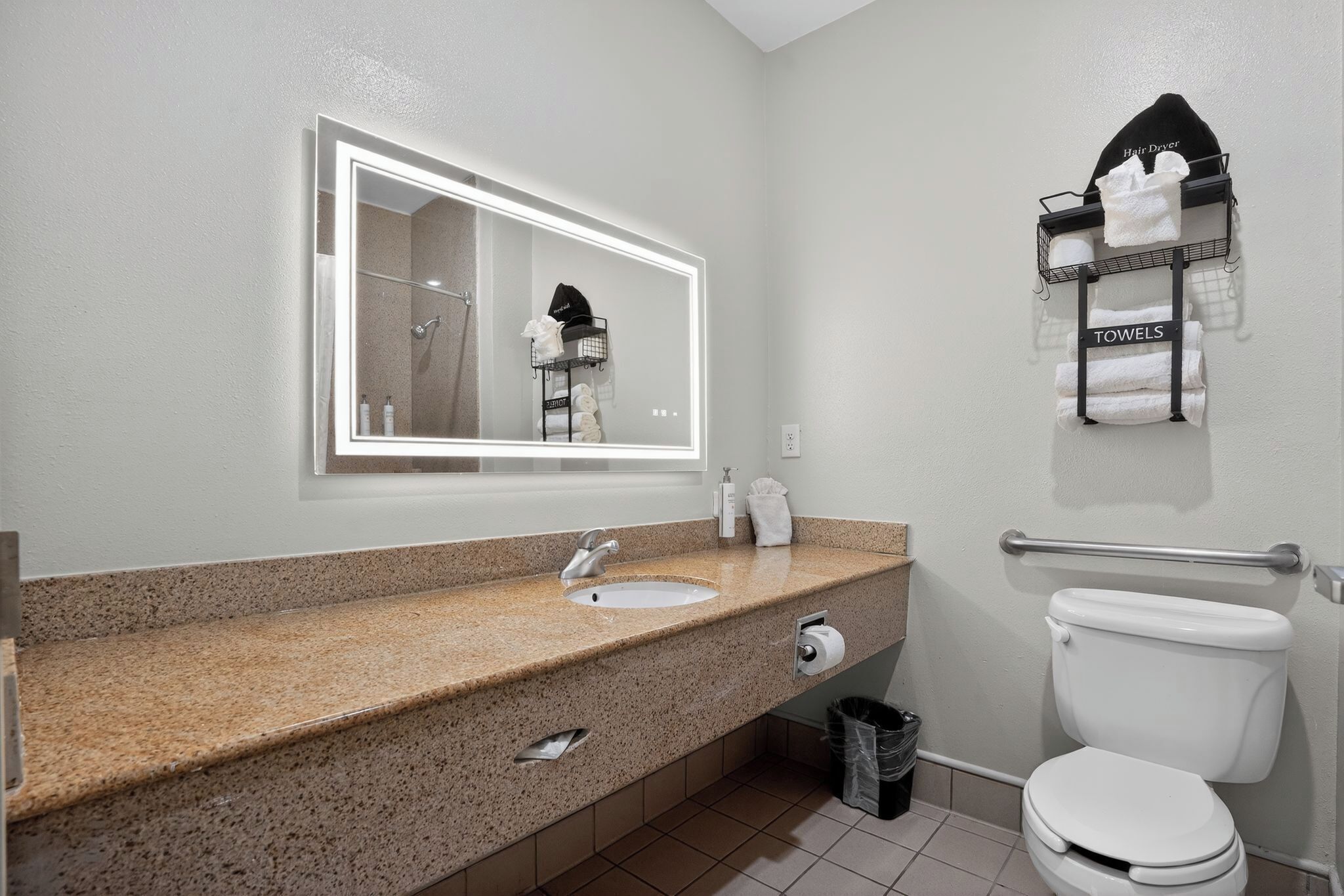 Suite, 1 King Bed | Bathroom | Combined shower/tub, free toiletries, hair dryer, towels
