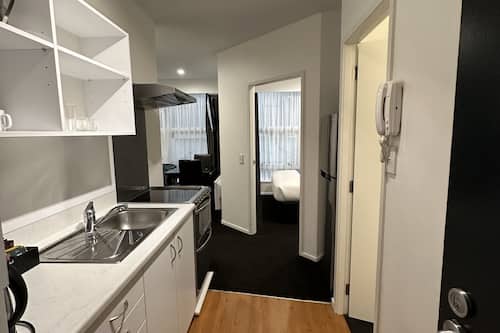 Appartement, 2 chambres | Cuisine privée | Réfrigérateur, micro-ondes, plaque de cuisson, machine à expresso
