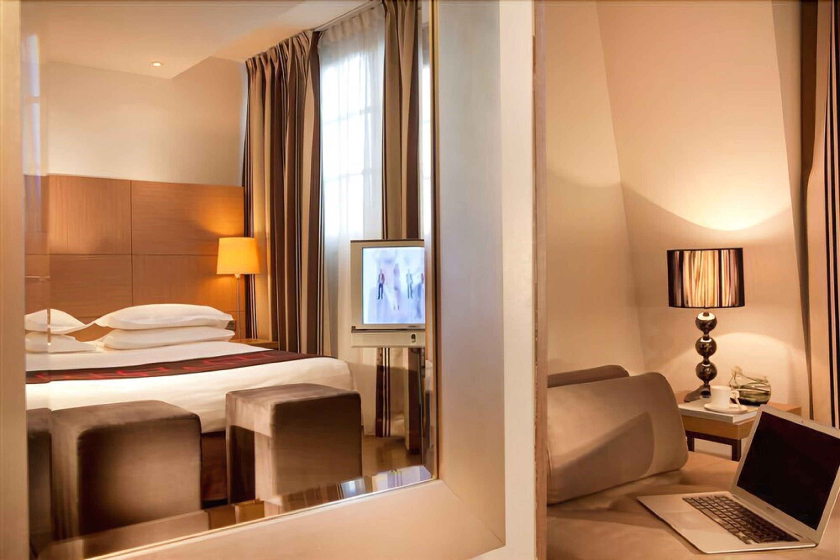 executive double room | premium bedding, minibar, in-room safe, desk
