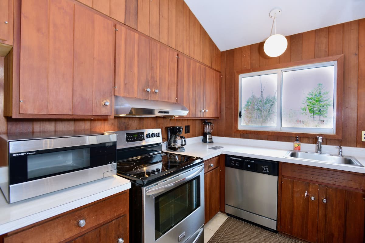 premier house, multiple bedrooms, fireplace | private kitchen | dining tables