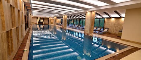 Indoor pool, open 6:00 AM to 10:00 PM, sun loungers