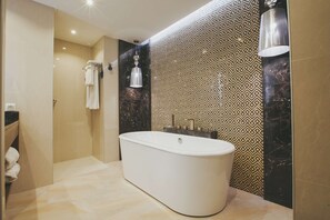 Suite, 1 Bedroom | Bathroom | Free toiletries, hair dryer, bathrobes, slippers