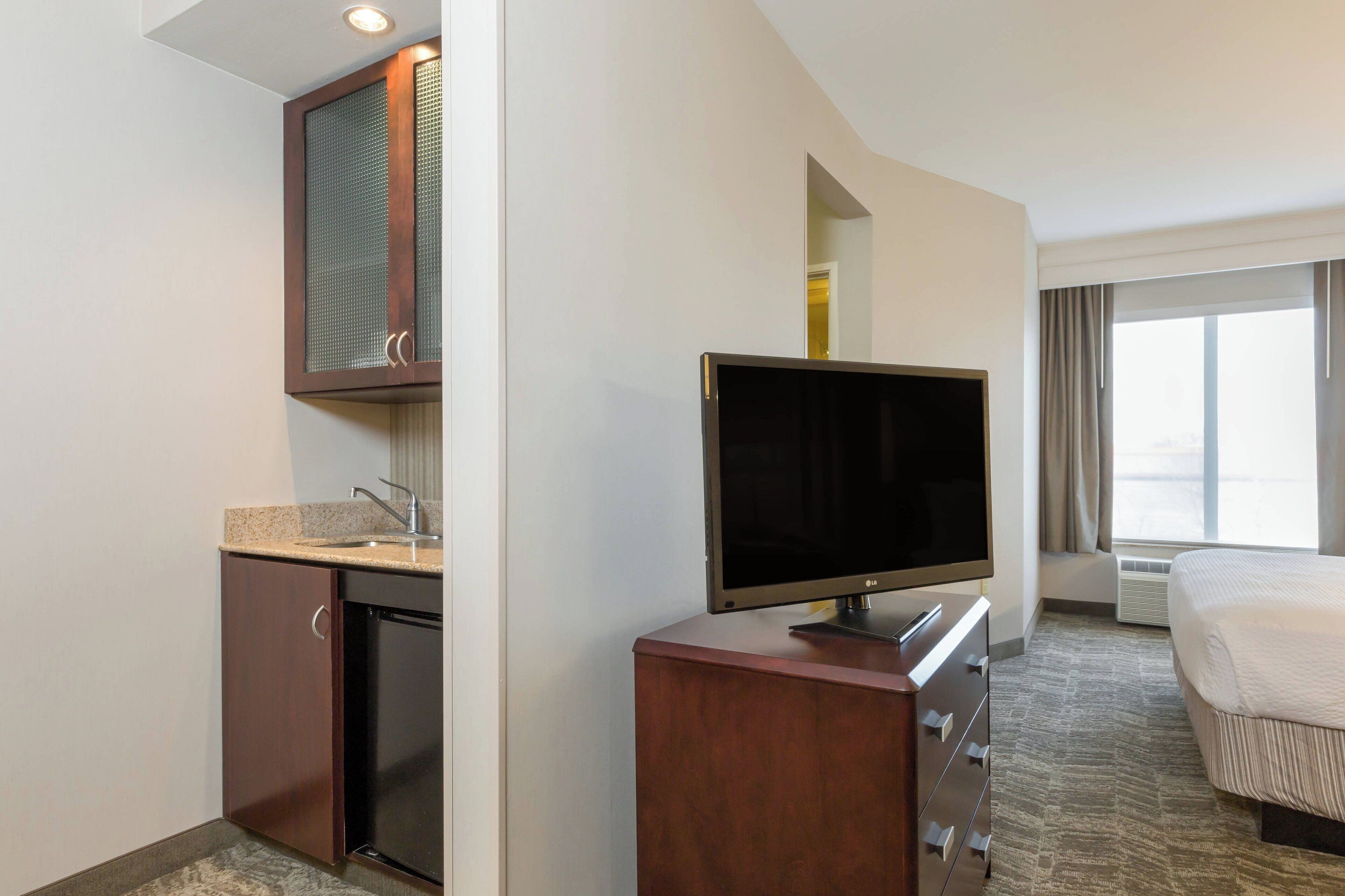 premium bedding, pillow-top beds, desk, iron/ironing board