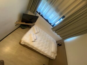 Economy Double Room Single Use, 1 Katil Bujang XL (Large Single) | Meja, kalis bunyi, seterika/papan seterika, Wi-fi percuma 