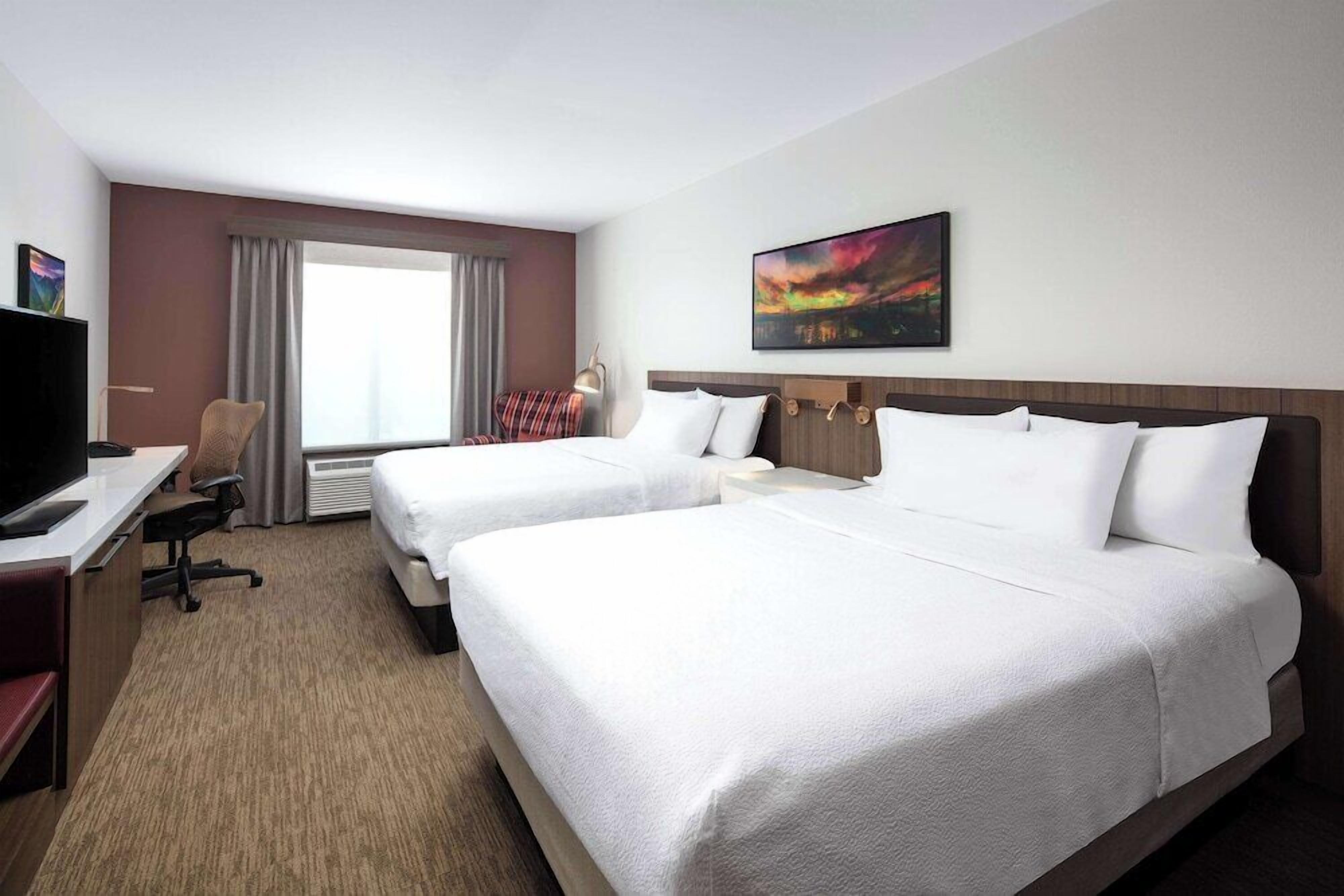 Premium bedding, pillowtop beds, desk, iron/ironing board