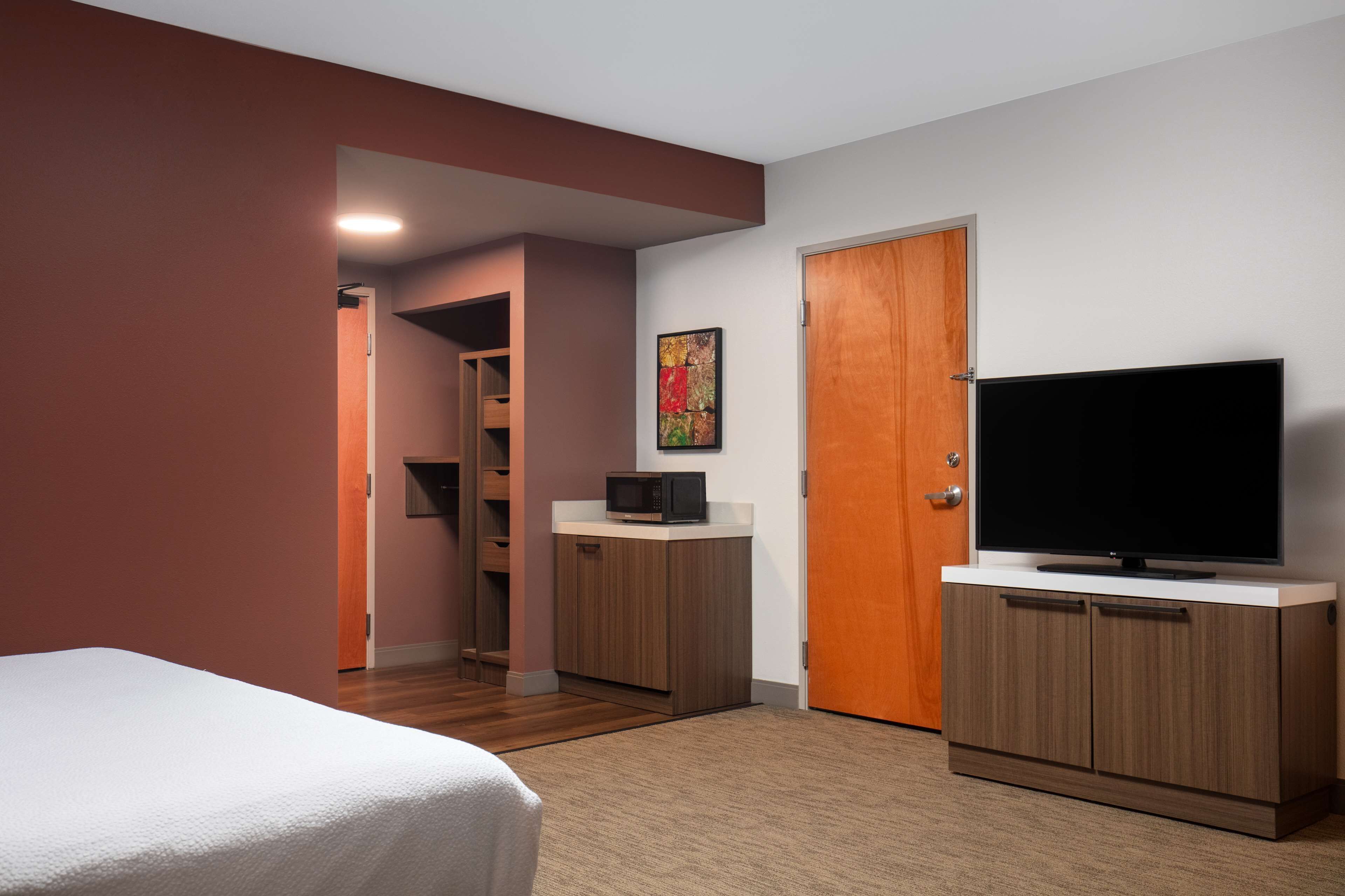 premium bedding, pillow-top beds, desk, iron/ironing board