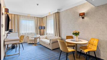 Senior suite | Woonruimte | Een ledtelevisie