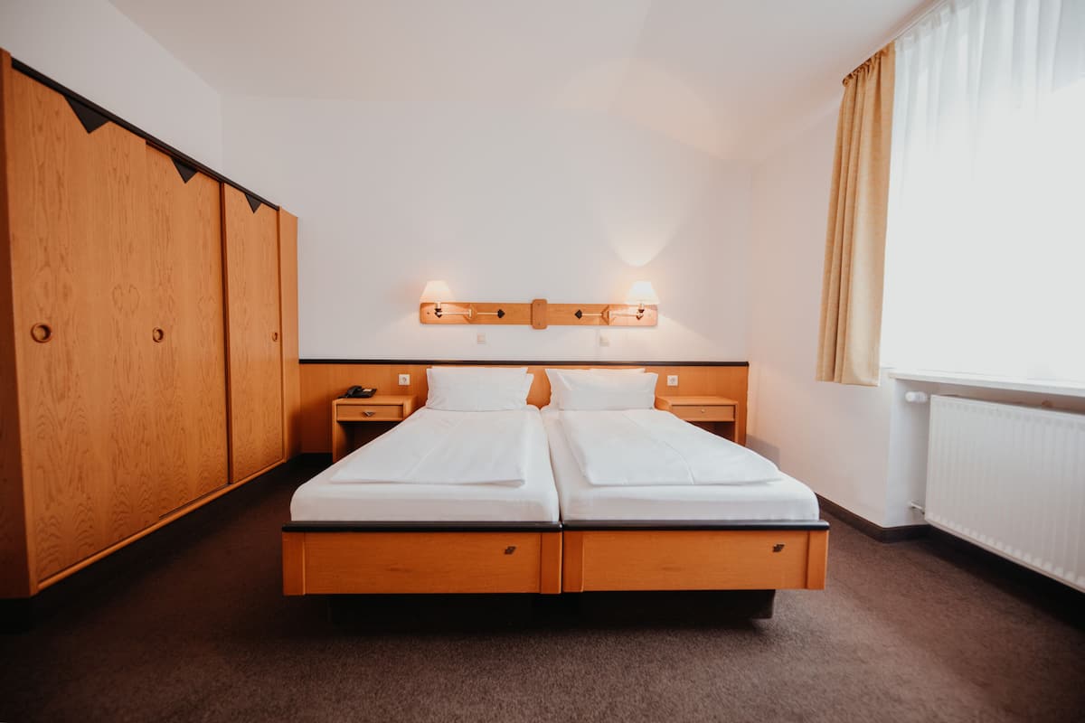 Habitación doble clásica | Minibar, wifi gratis y ropa de cama