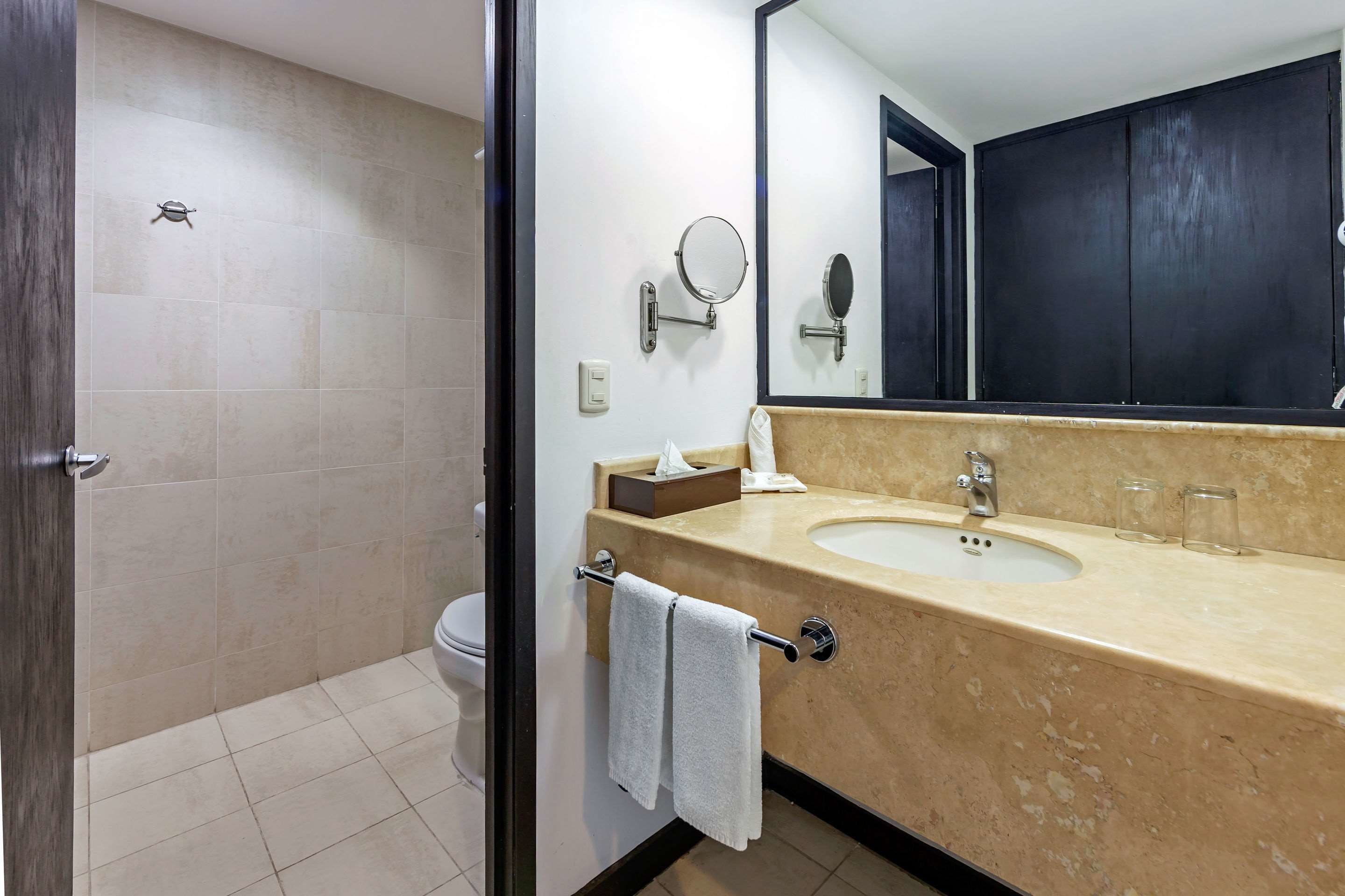 room, 1 king bed | bathroom | shower, rainfall showerhead, free toiletries, hair dryer