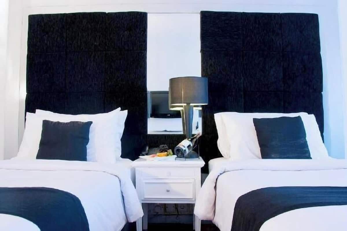 Down comforters, pillowtop beds, minibar, in-room safe