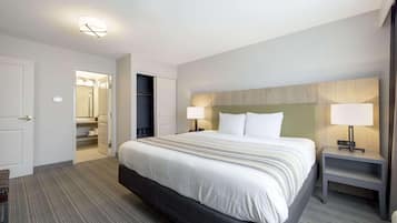 Hypo-allergenic bedding, down duvets, desk, laptop workspace