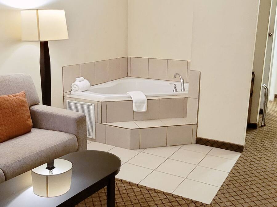 Suite, 1 King Bed with Sofa bed, Jetted Tub | Premium bedding, desk, blackout curtains, iron/ironing board