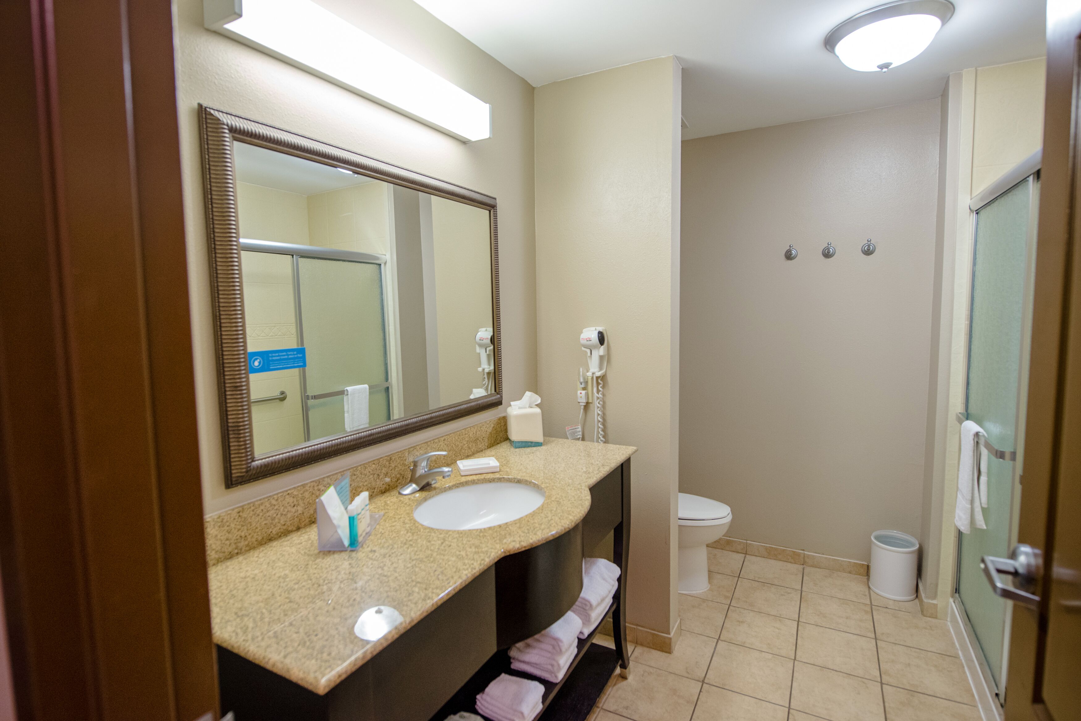 one king studio suite non smoking | bathroom | bathtub, hair dryer, towels
