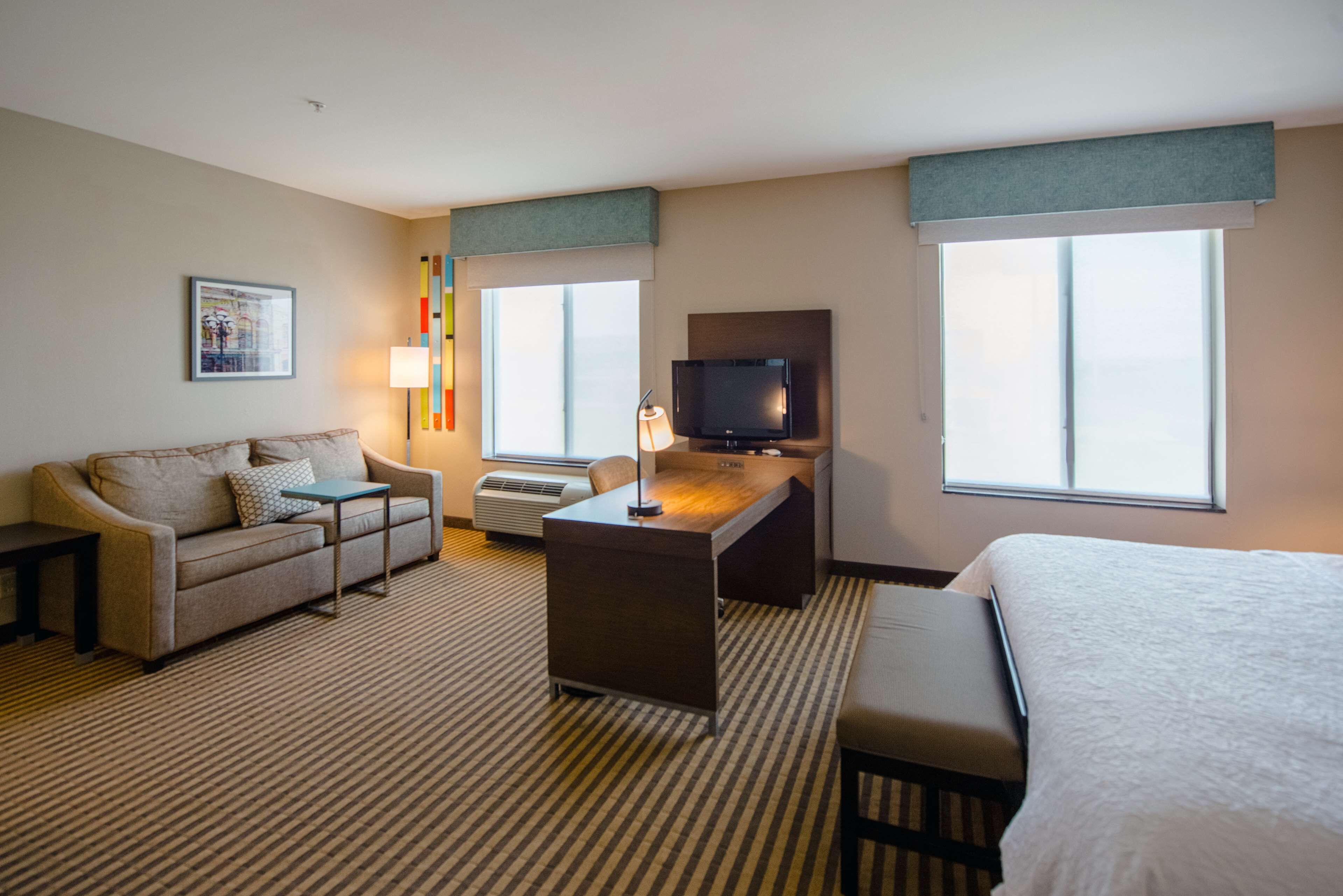 One king studio suite non smoking | Living area | 40-inch plasma TV with cable channels, TV, pay movies