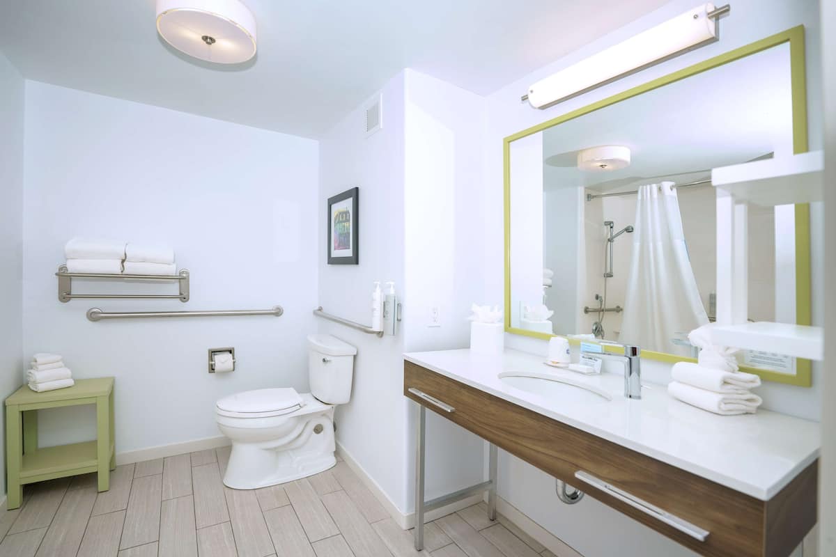 two queen beds accessible w tub non smoking | bathroom | hydromassage showerhead, hair dryer, towels, soap