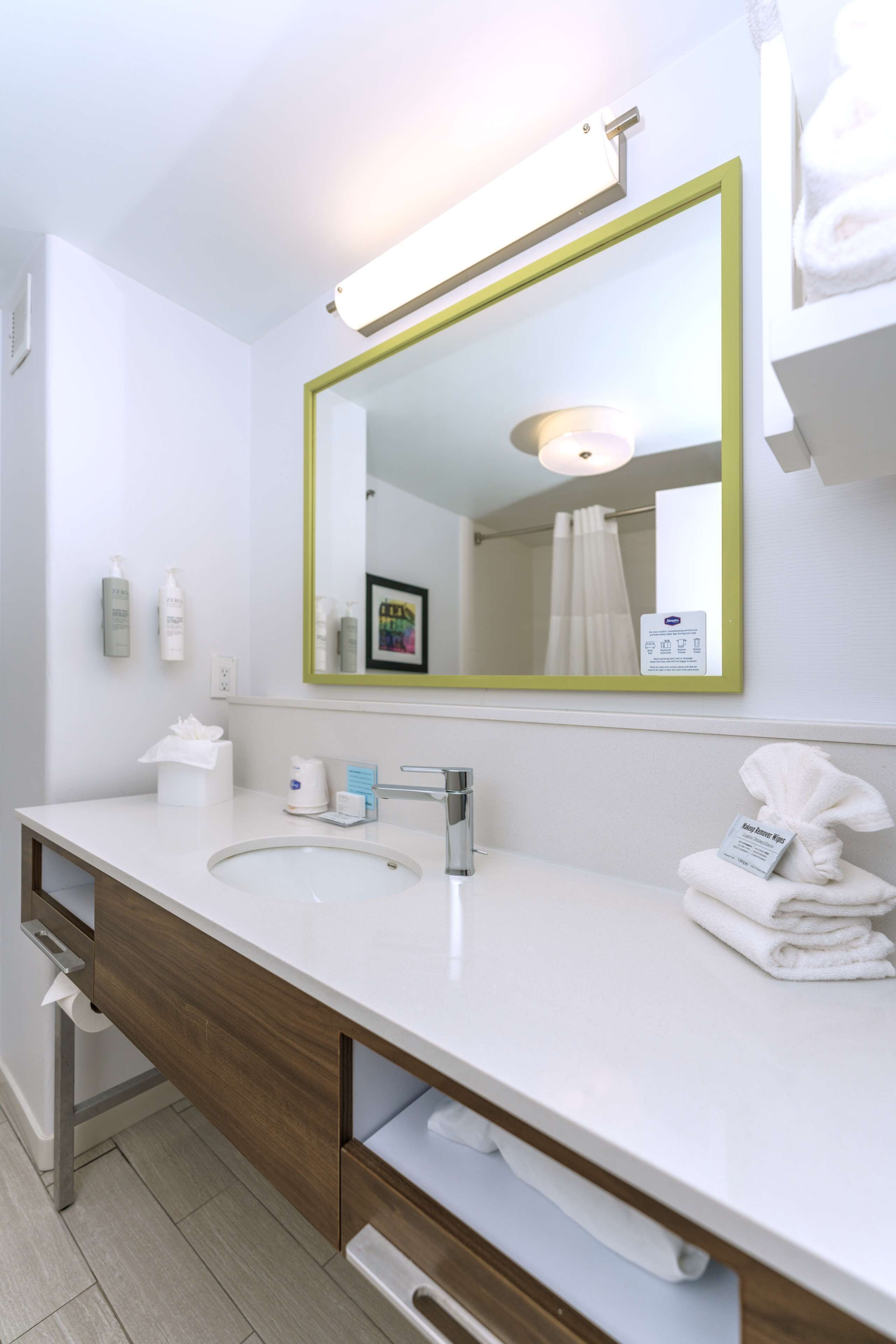 hydromassage showerhead, hair dryer, towels, soap