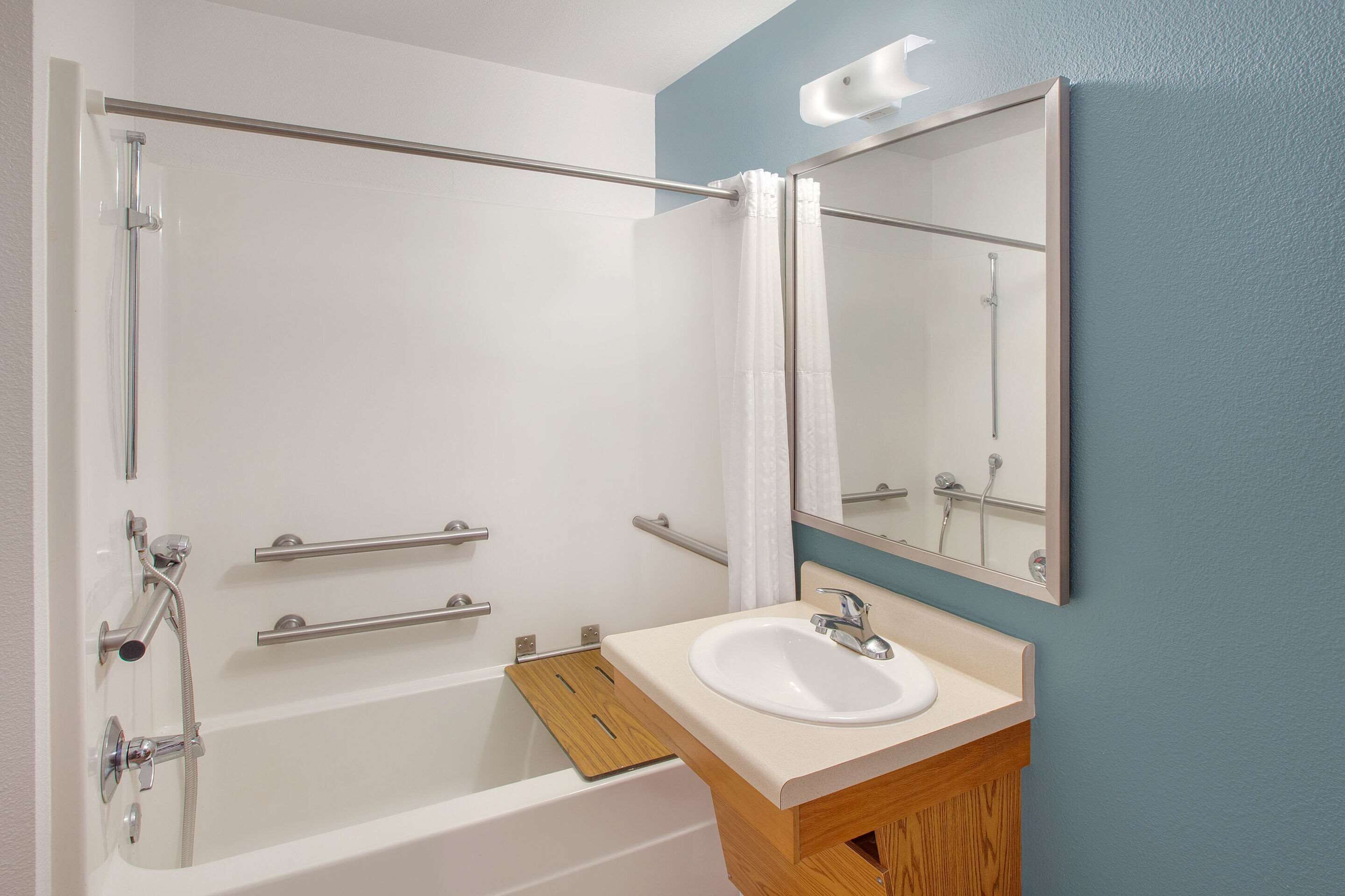 combined shower/bathtub, hair dryer, towels, soap