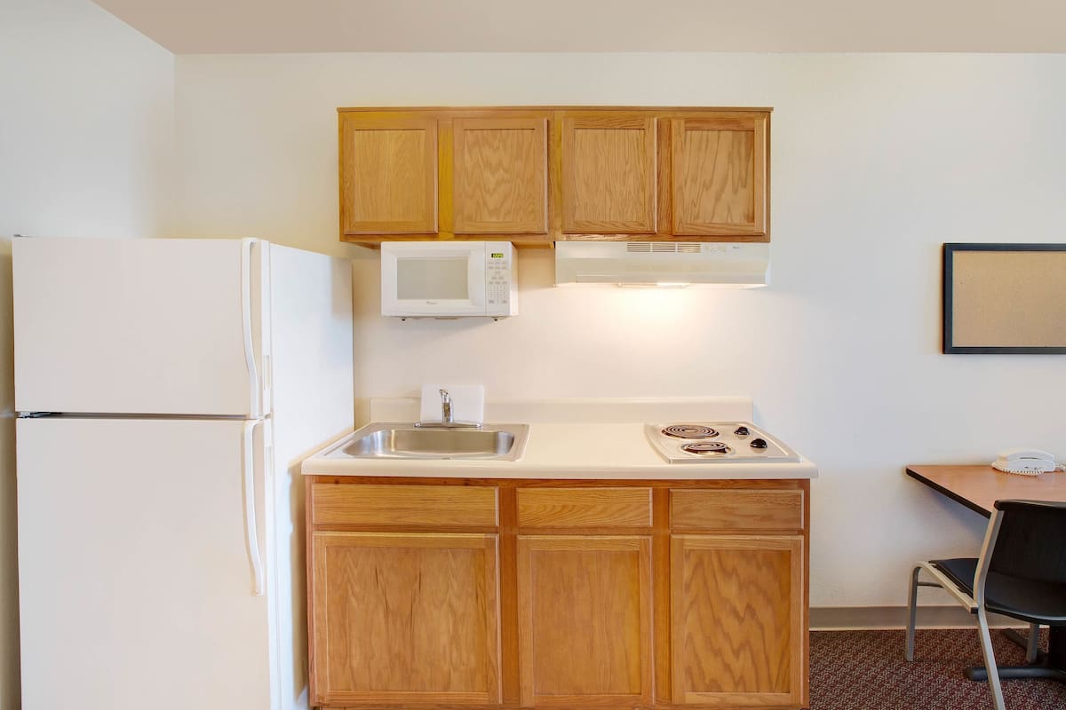 full-sized fridge, microwave, stovetop, freezer