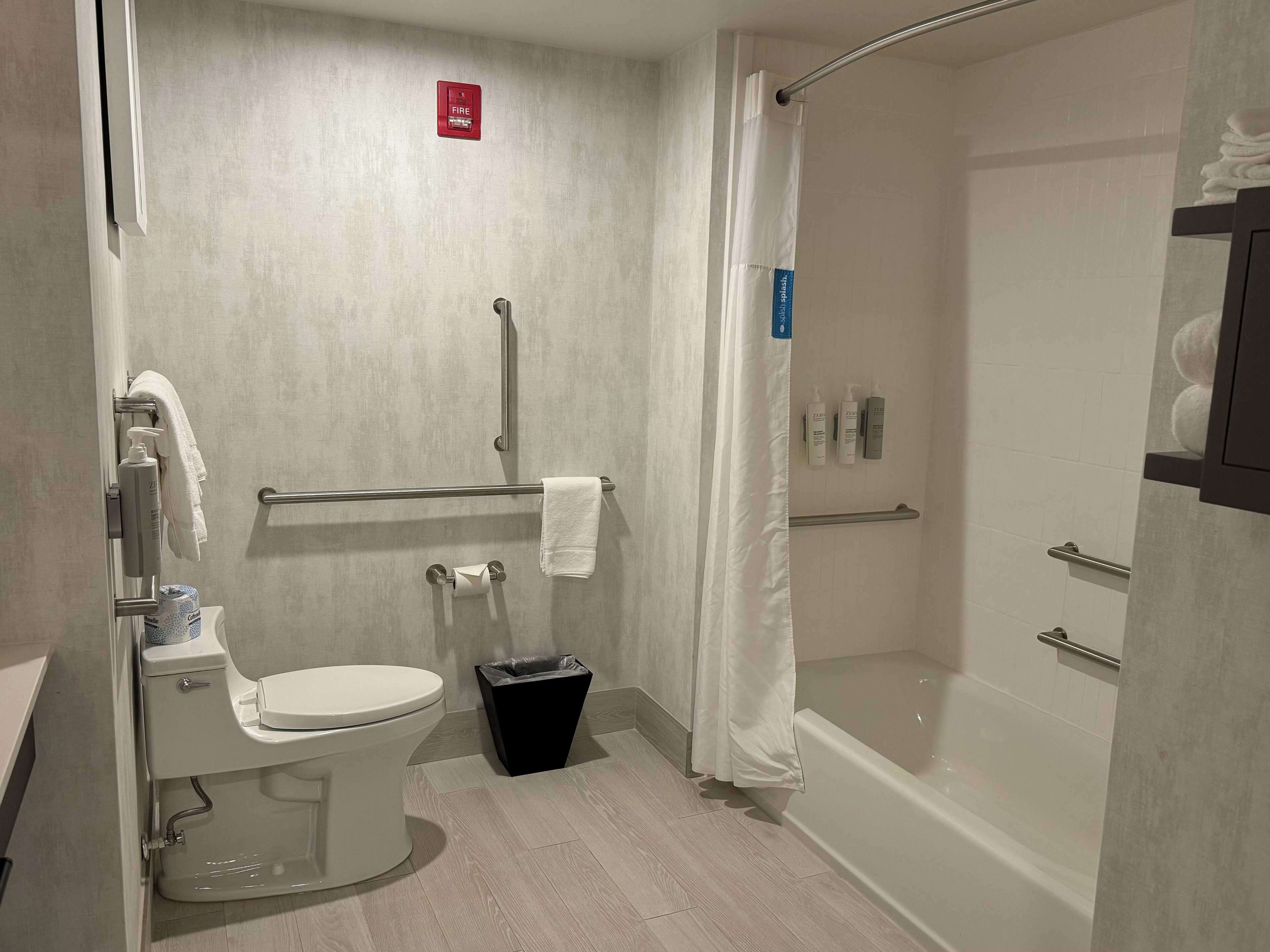 room, 1 king bed, accessible (mobility & hearing, 3x3 shower) | bathroom | hydromassage showerhead, free toiletries, hair dryer, towels