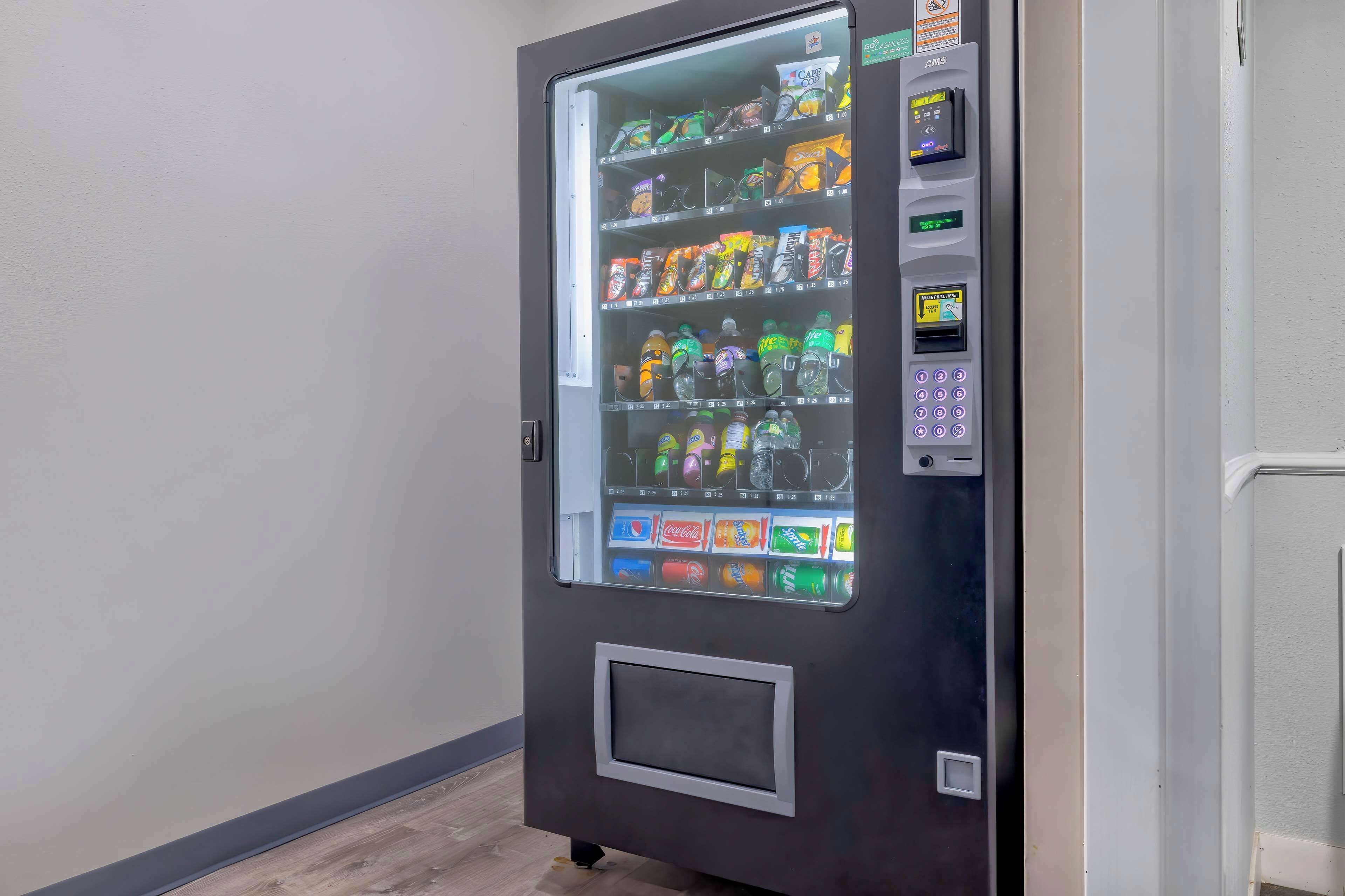A vending machine with various beverages and snacks.