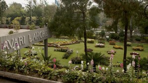 A sign for "AVARI LAHORE" with a garden in the background. - Avari Lahore (Lahore)
