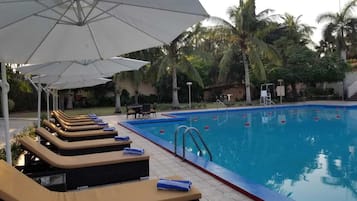 Outdoor pool, pool umbrellas, pool loungers