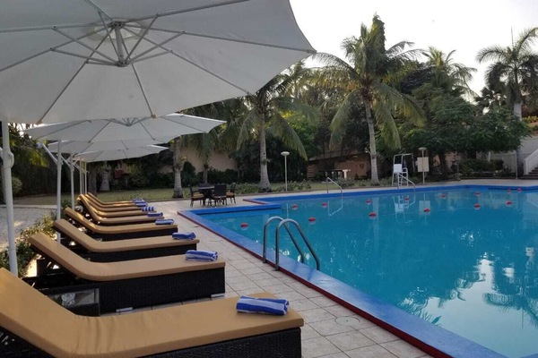 Outdoor pool, pool umbrellas, sun loungers