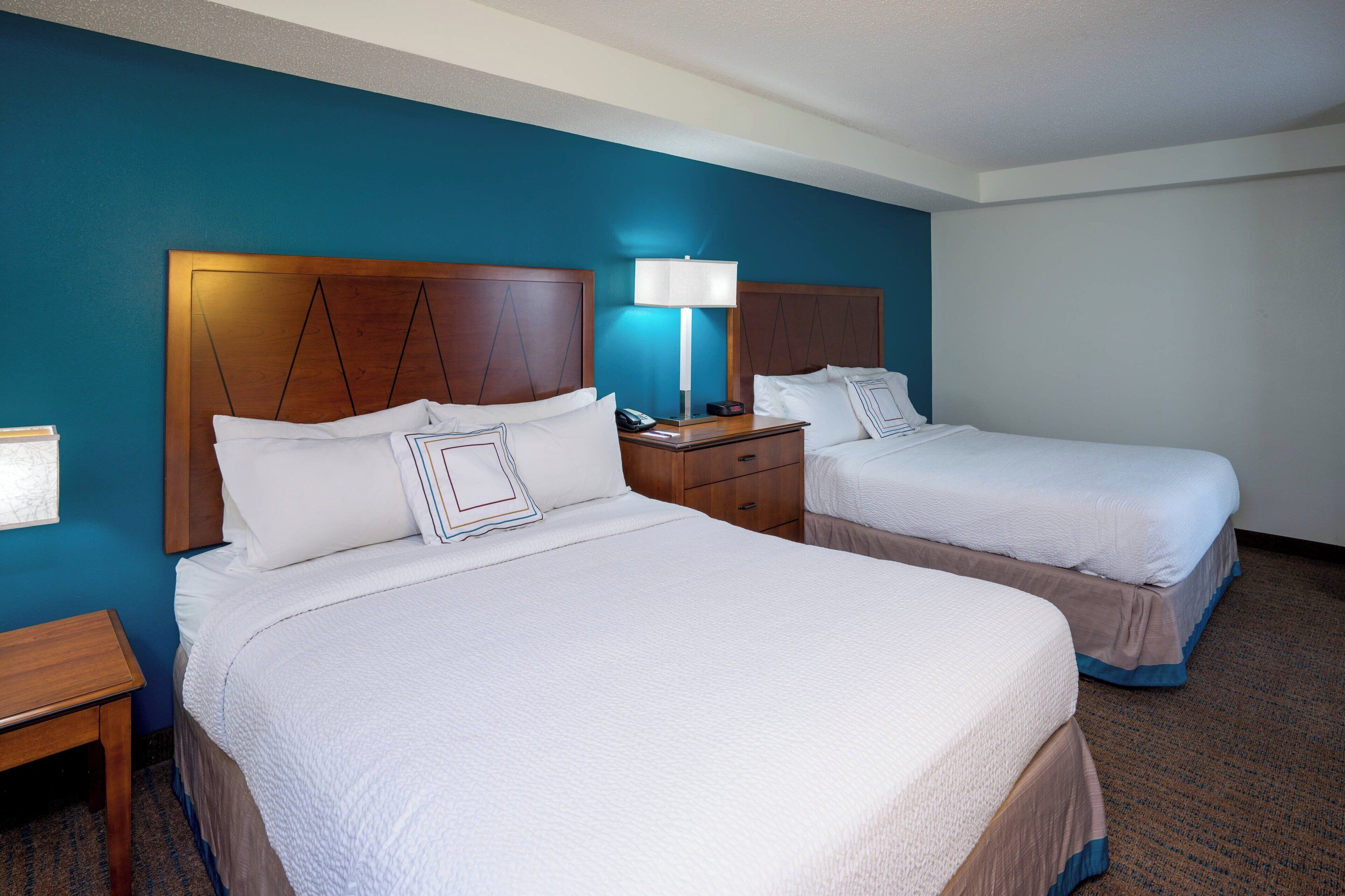 desk, laptop workspace, blackout curtains, iron/ironing board