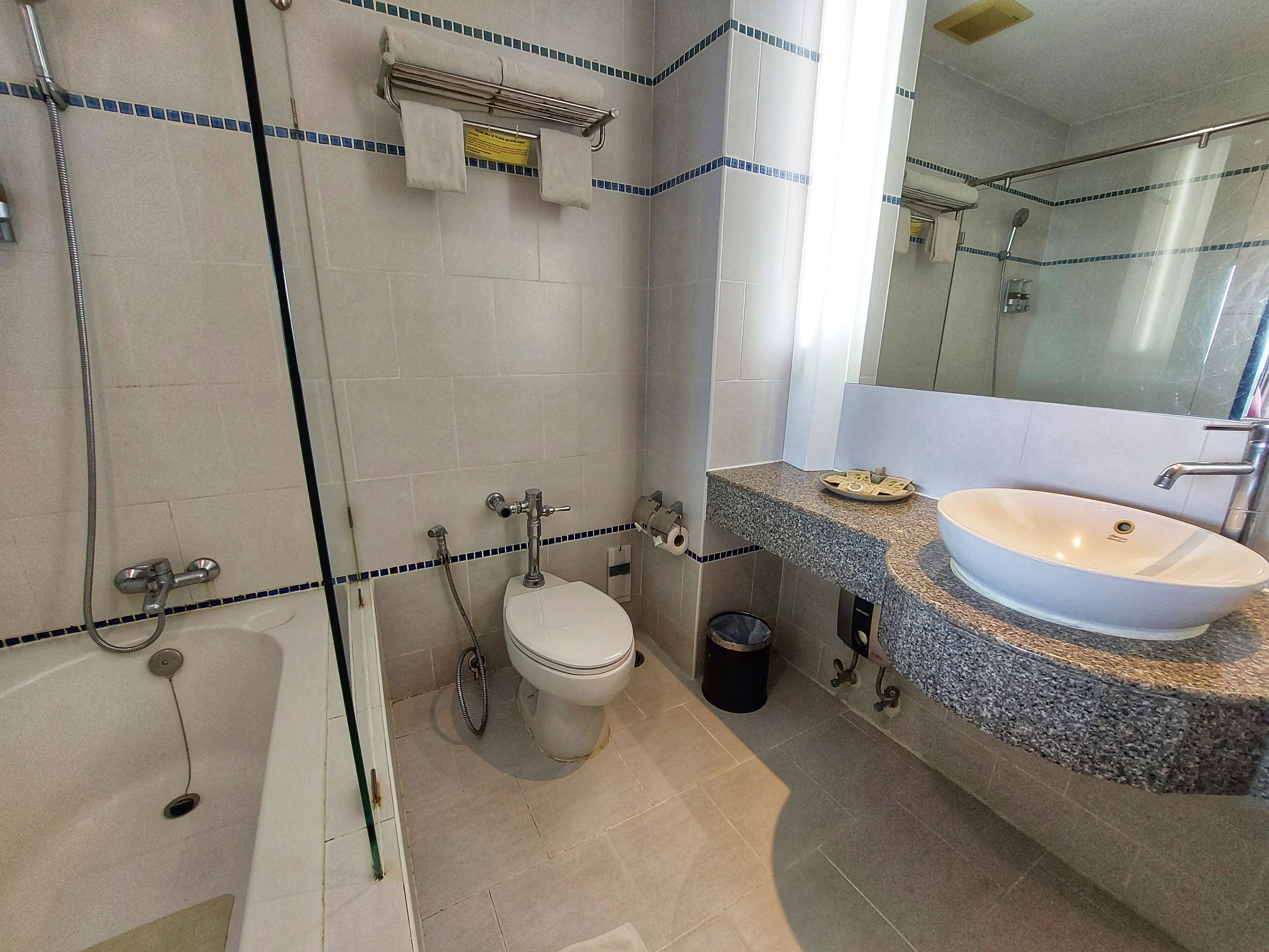 Separate tub and shower, free toiletries, hair dryer, bathrobes