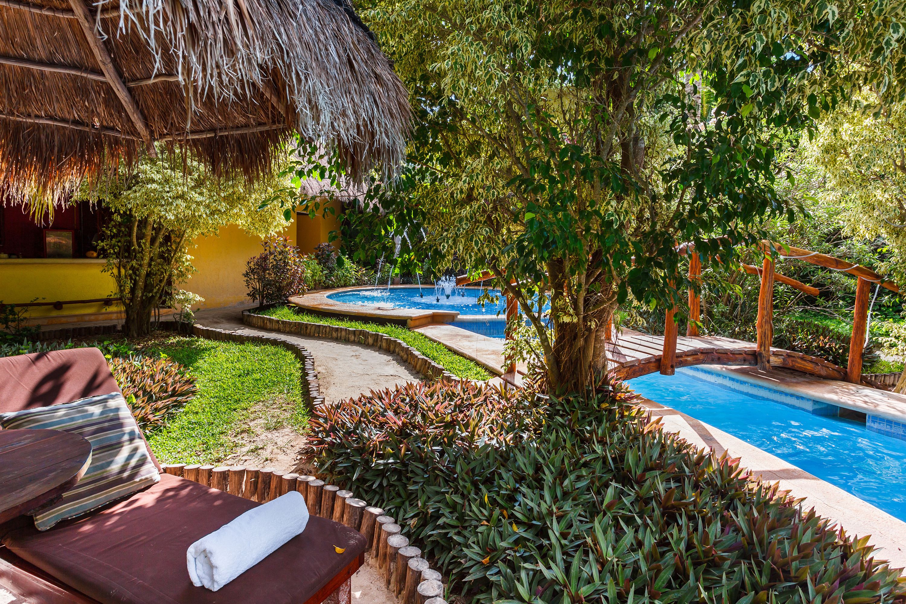 outdoor pool, pool umbrellas, pool loungers