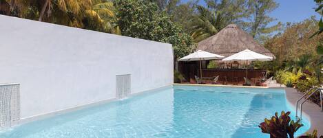 Outdoor pool, pool umbrellas, sun loungers