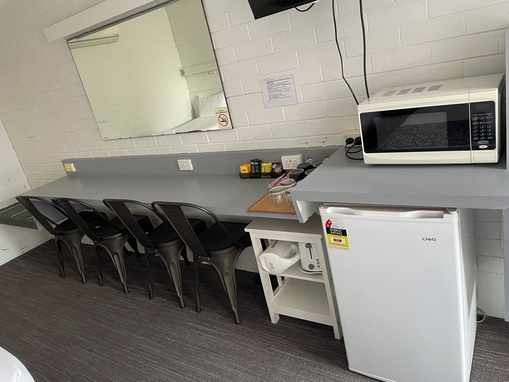 economy family room- located 1st floor (no elevator) | 1 bedroom, desk, laptop workspace, iron/ironing board