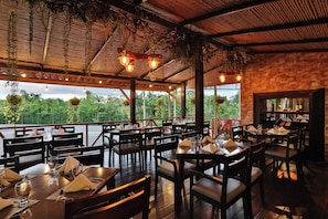 Breakfast, lunch, dinner served; international cuisine, pool views