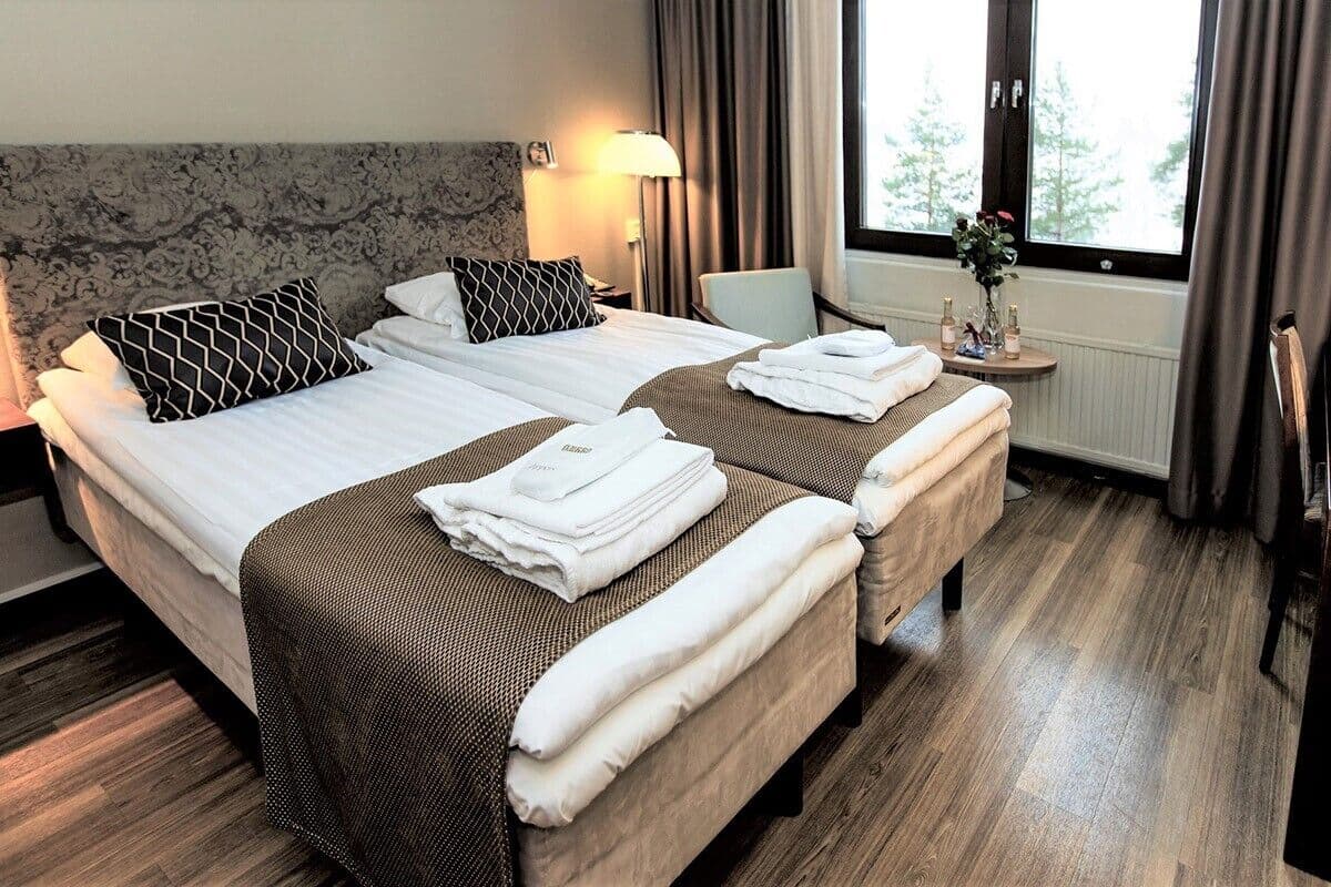 Chambre avec lits jumeaux | 1 chambre, literie de qualitĂ©, rideaux dâobscurcissement