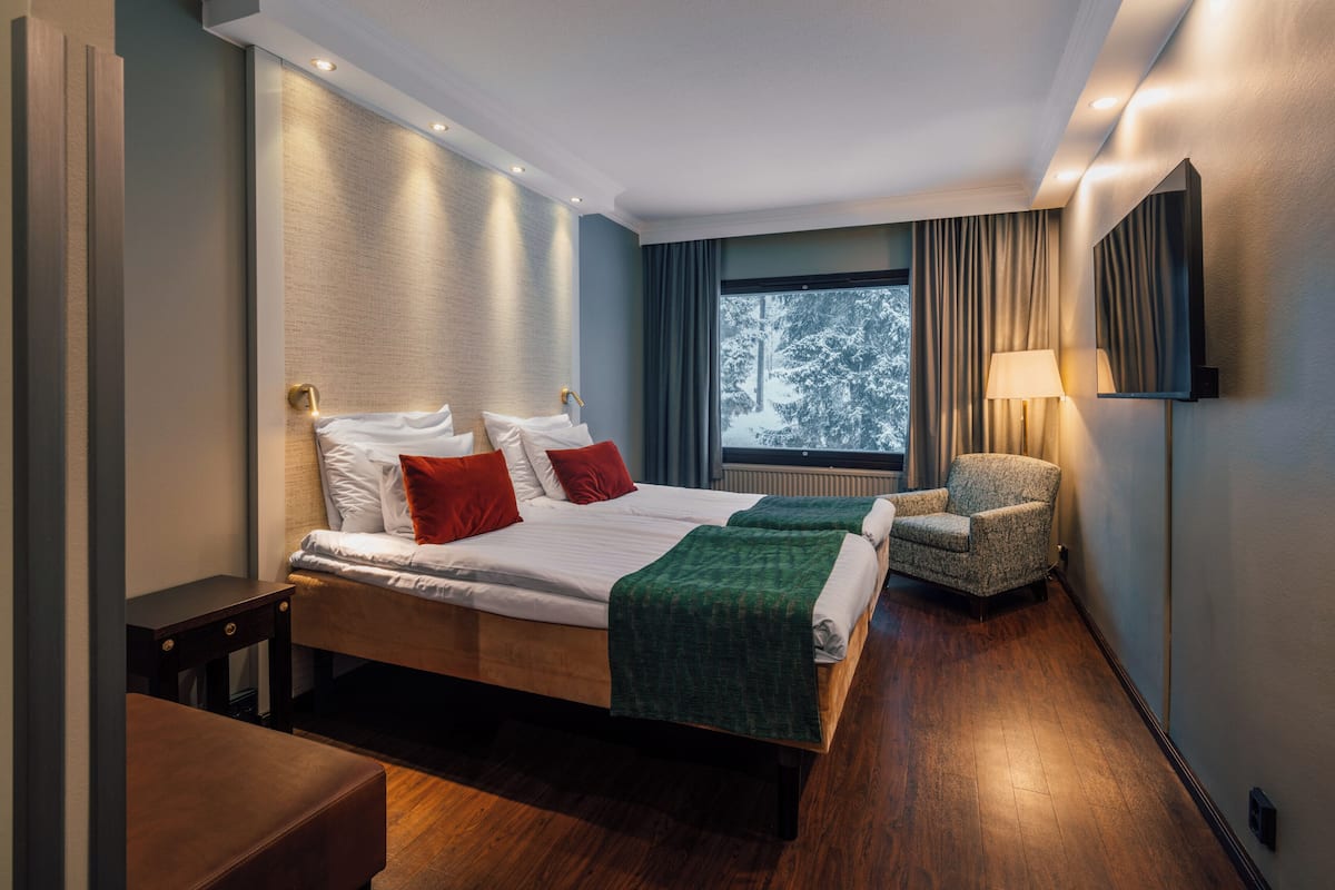 Premium bedding, blackout drapes, soundproofing, free WiFi