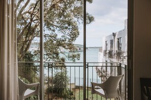 Urban Balcony Premium | Premium bedding, in-room safe, blackout drapes, iron/ironing board