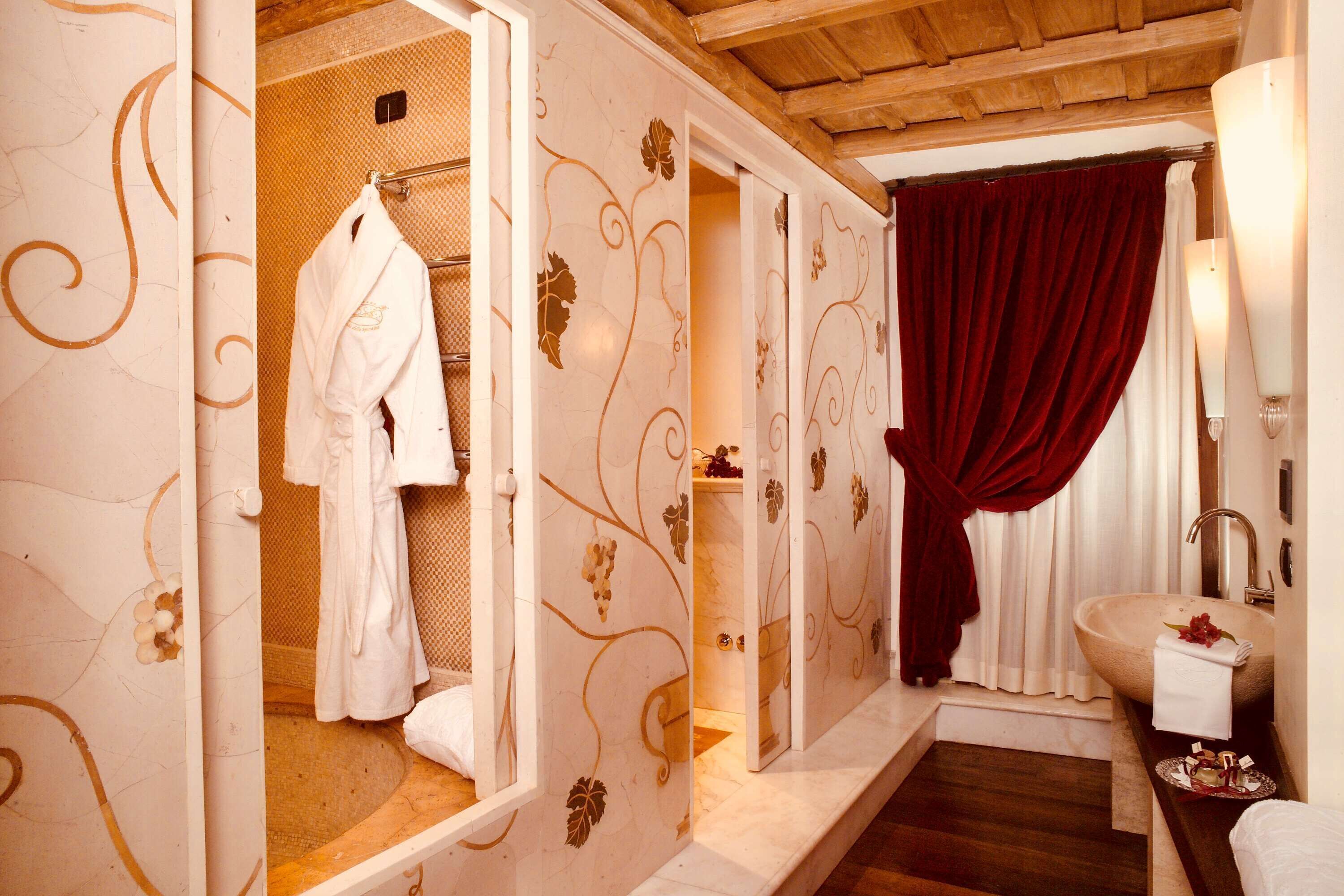 designer toiletries, hair dryer, bathrobes, bidet