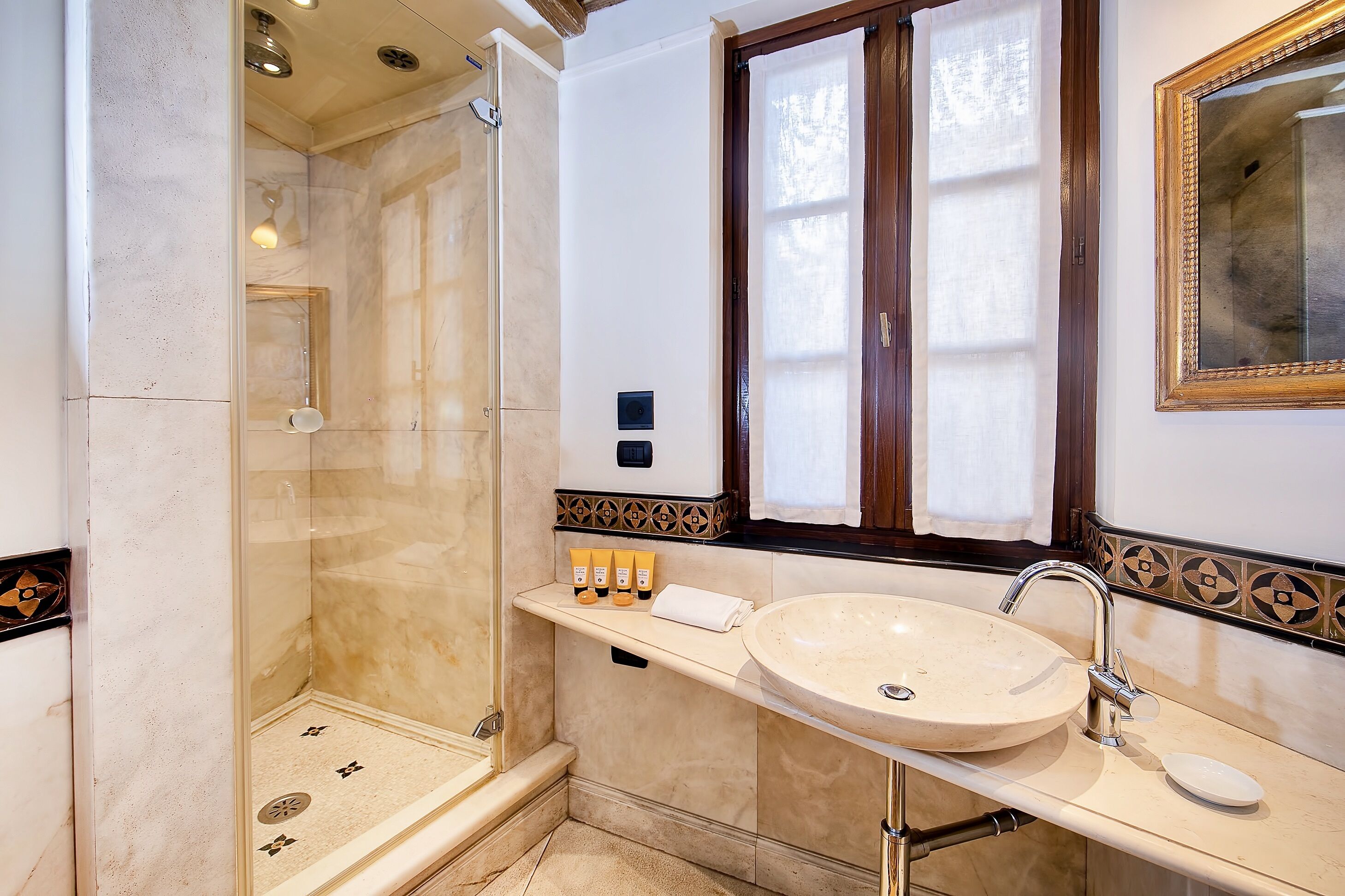 designer toiletries, hair dryer, bathrobes, bidet