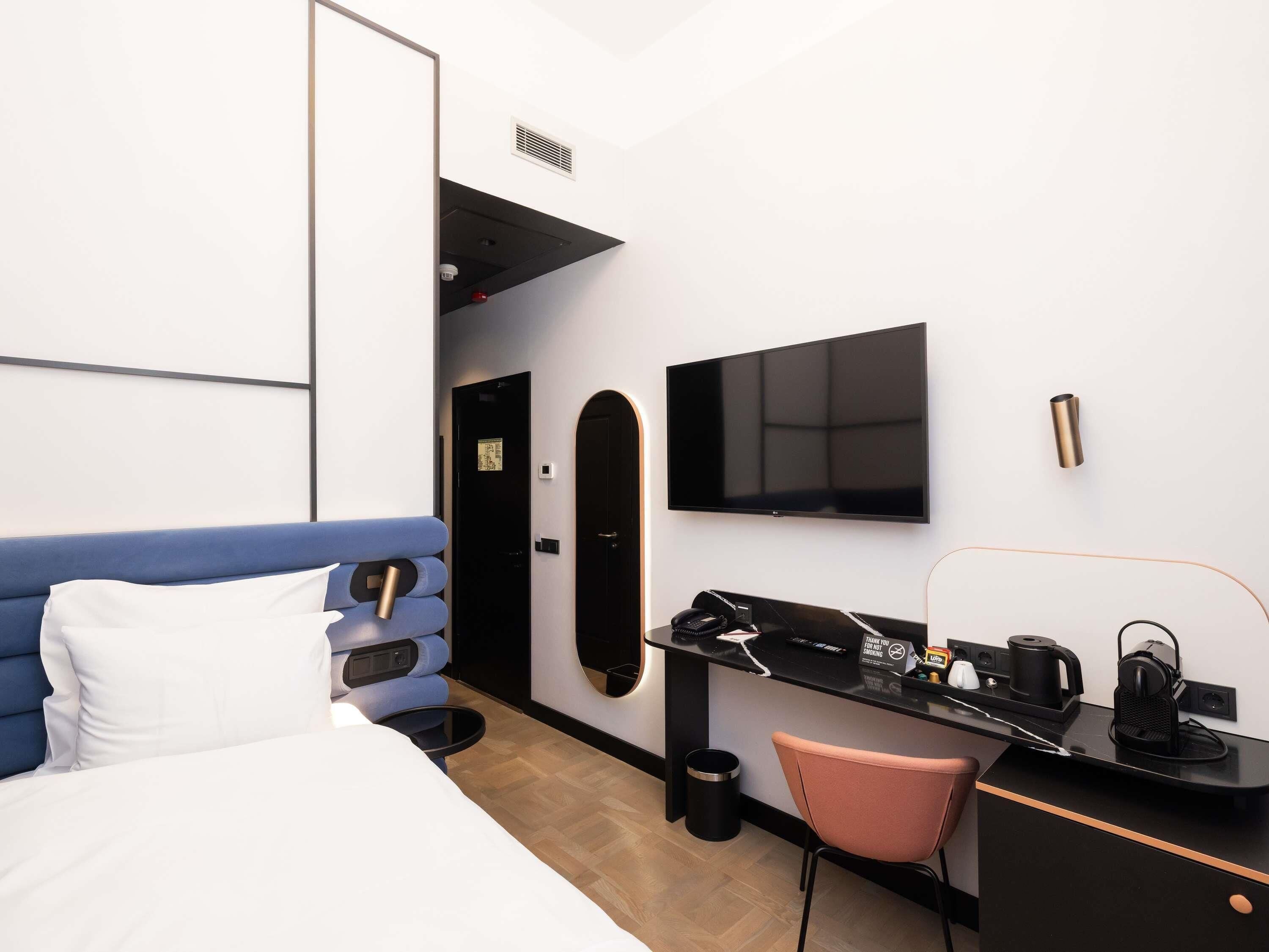 Comfort Room (Essential) | Hypo-allergenic bedding, in-room safe, desk, laptop workspace