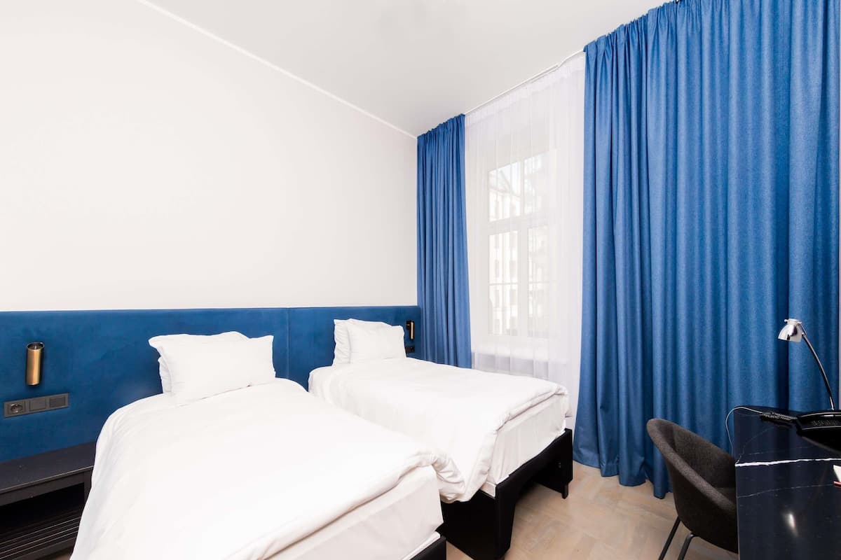 Hypo-allergenic bedding, in-room safe, desk, laptop workspace