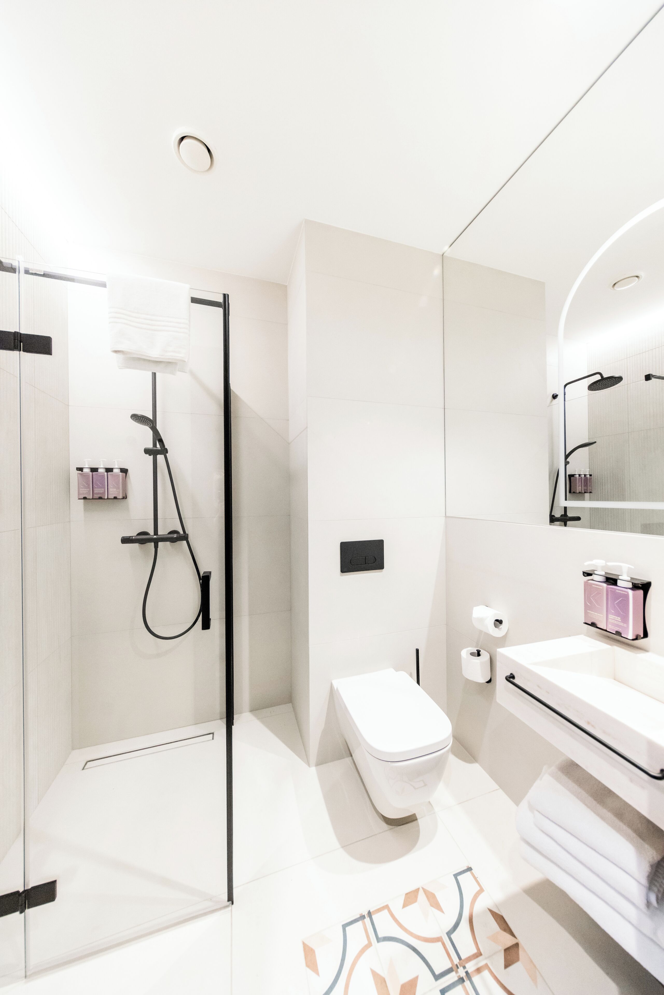 shower, eco-friendly toiletries, hair dryer, towels