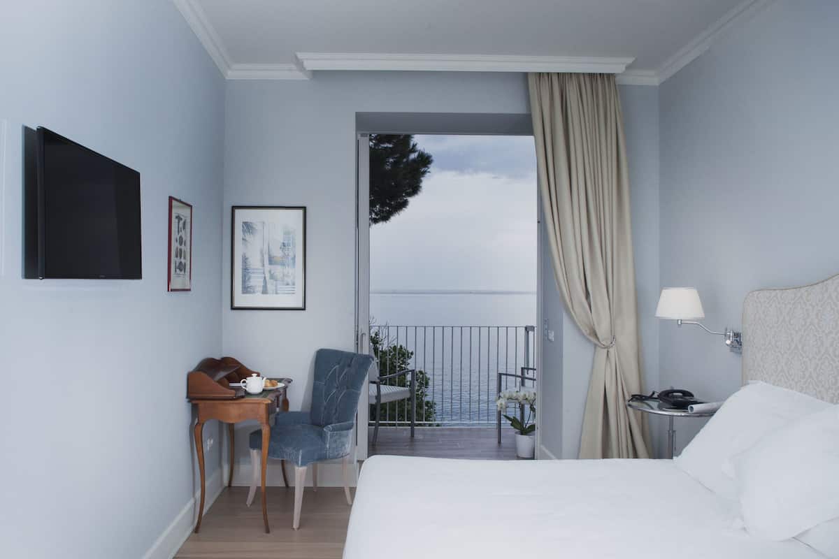 Classic Double Room, Balcony, Sea View | 1 bedroom, minibar, in-room safe, desk