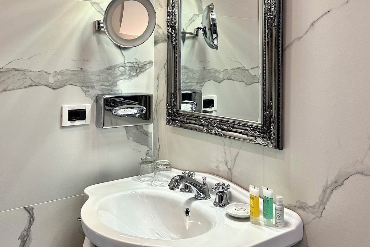 family suite | bathroom | hair dryer, bidet, towels