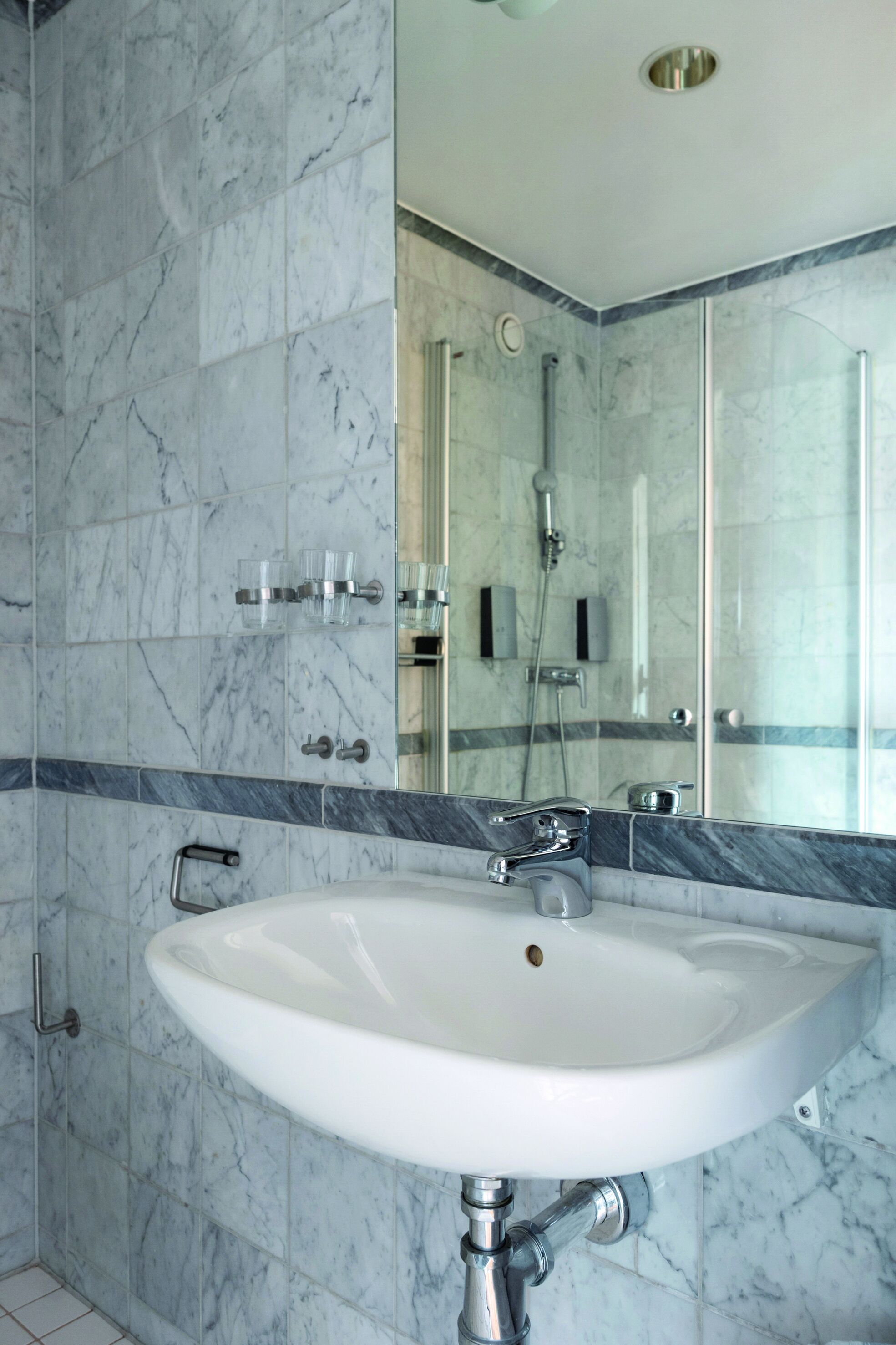 standard single room | bathroom | shower, hair dryer, towels, soap