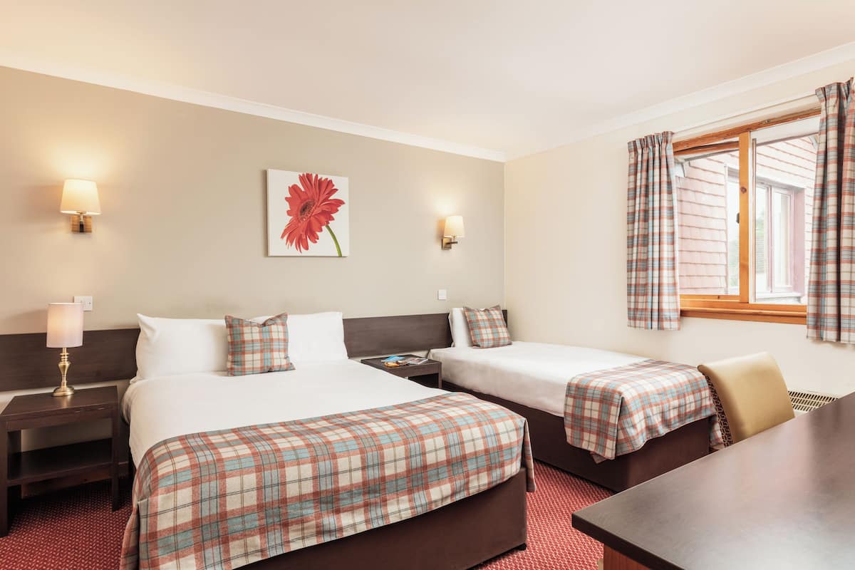 Family Room (2 Adults and 1 Child) | Desk, free WiFi, bed sheets, wheelchair access