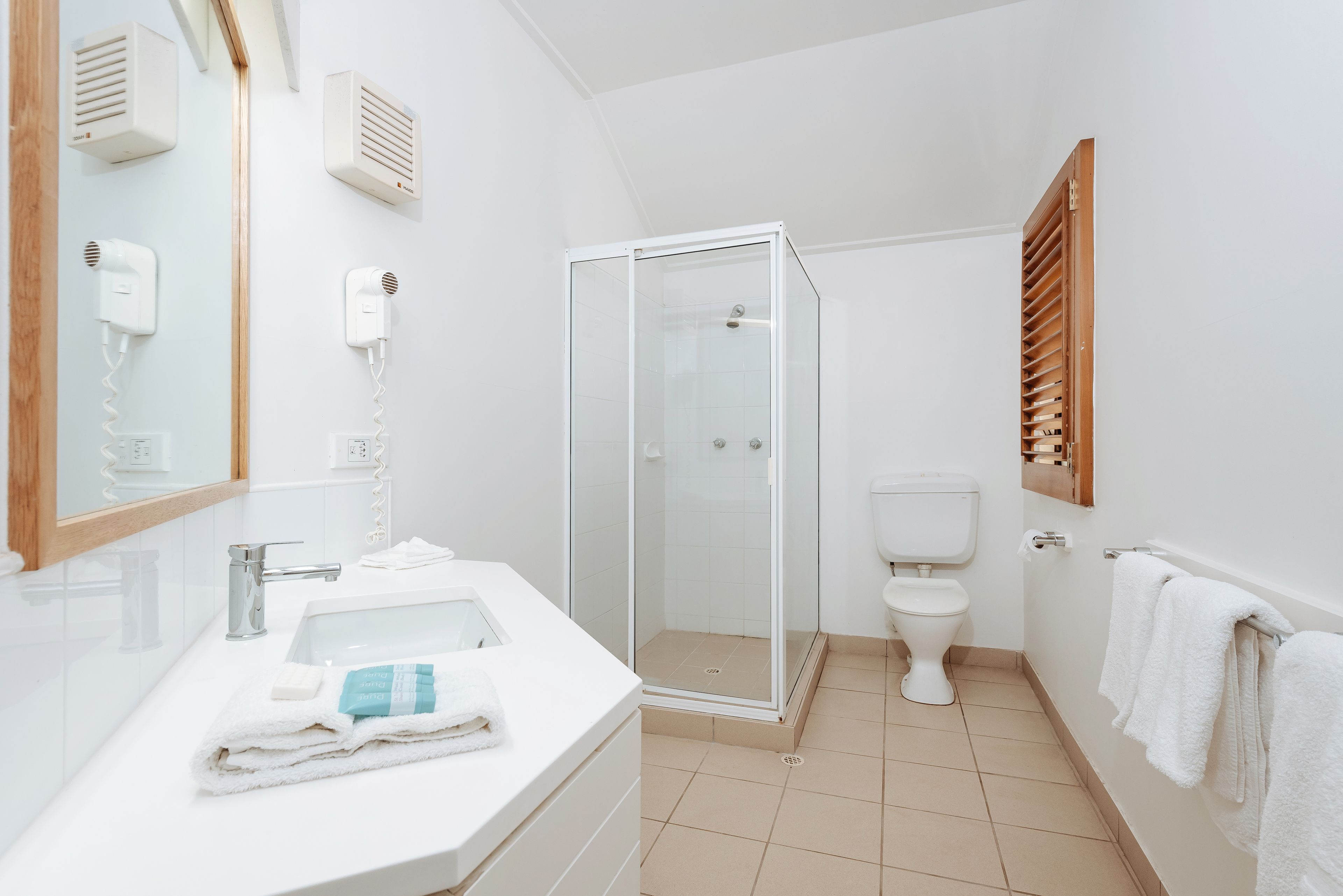 shower, eco-friendly toiletries, hair dryer, towels