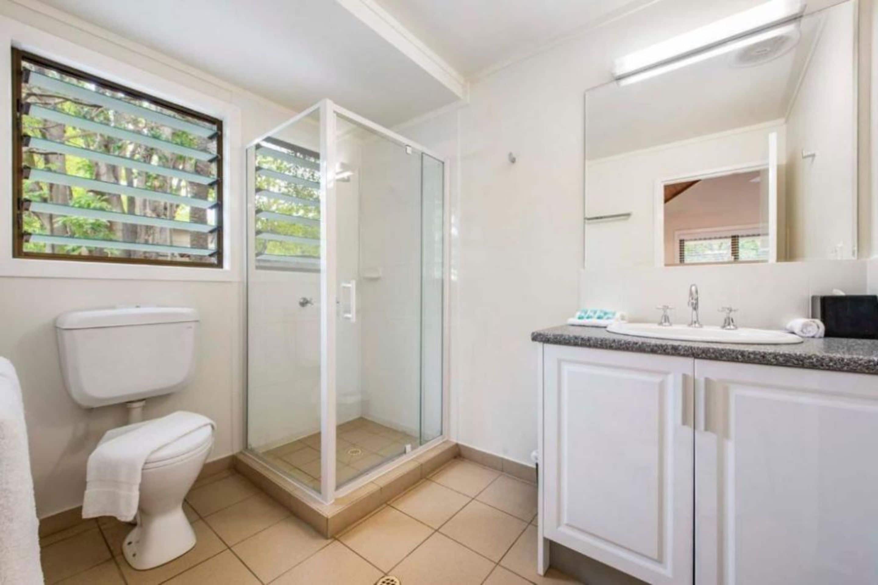 shower, eco-friendly toiletries, hair dryer, towels